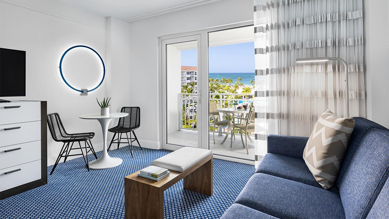 ab-one-bedroom-ocean-view-villa-living-room--balcony-interior-photo