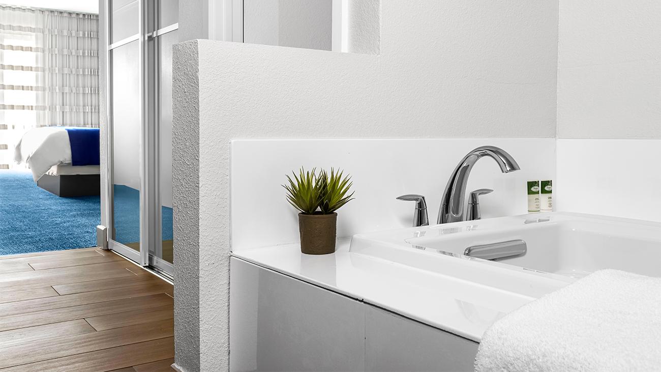 ab-two-bedroom-villa-master-bathroom-with-tub-interior-photo