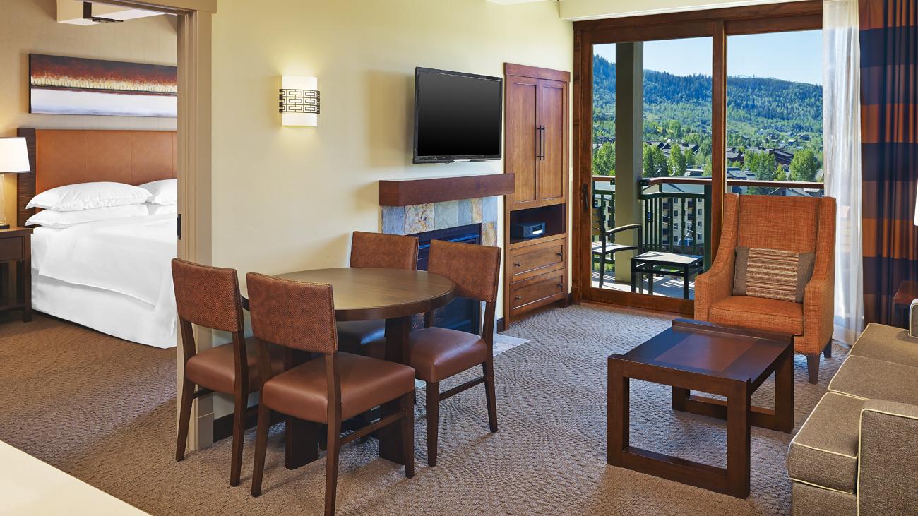 ssr-east-tower-two-bedroom-lockoff-dining-living-room-and-bedroom-interior-photo