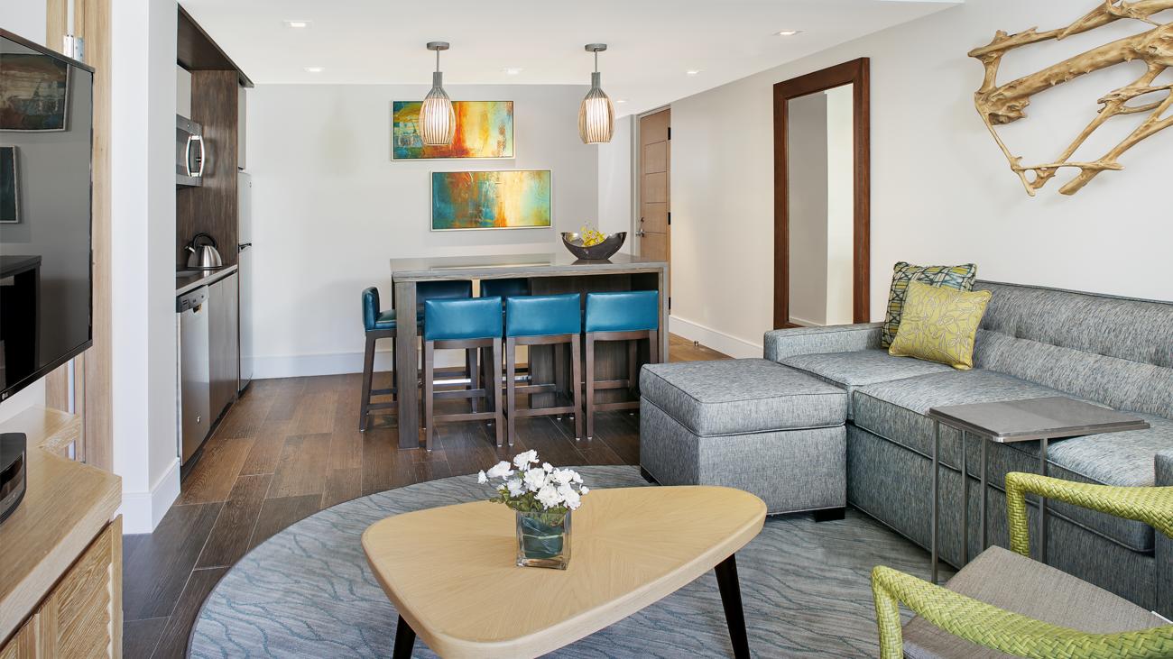 wsj-sunset-bay-two-bedroom-dining-and-living-room-and-kitchenette-interior-photo