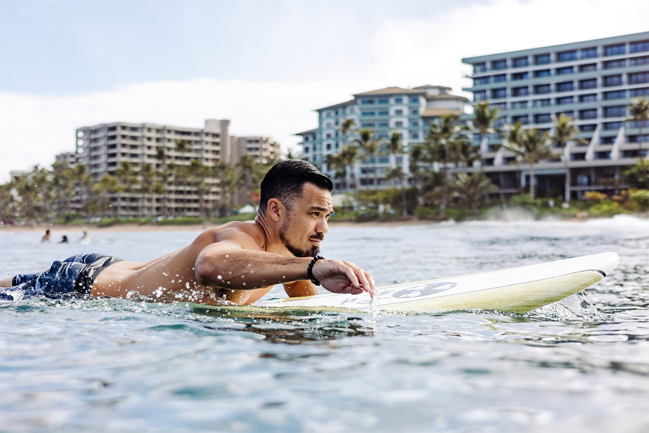 Man surfing near a Marriott Vacation Clubs resort