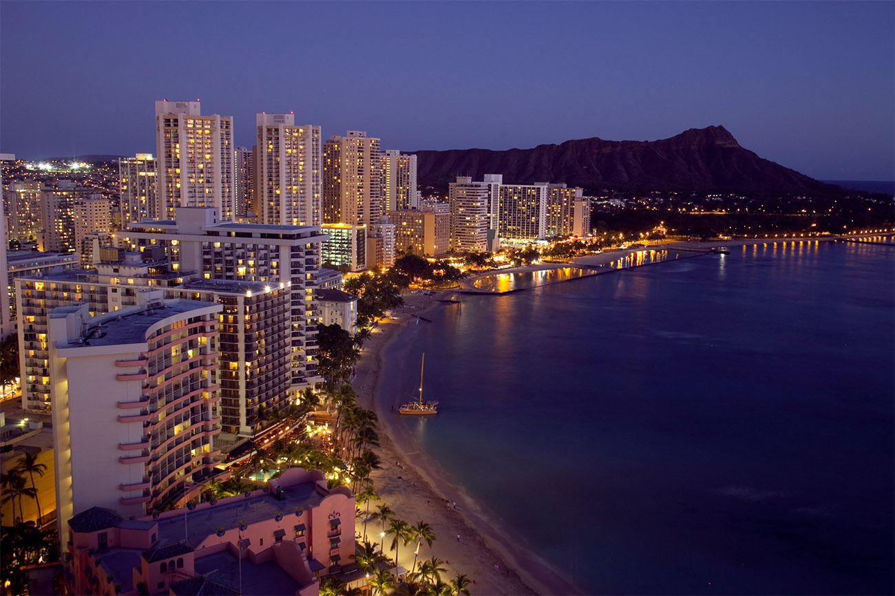 Waikīkī, Oahʻu, Hawaiʻi at night. Courtesy Hawai‘i Tourism Authority (HTA)/Taku Miyazawa