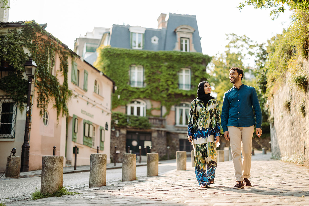 A couple strolling in historic France