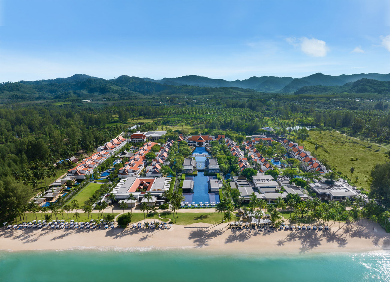 A high aerial shot of the resort grounds during the daytime.