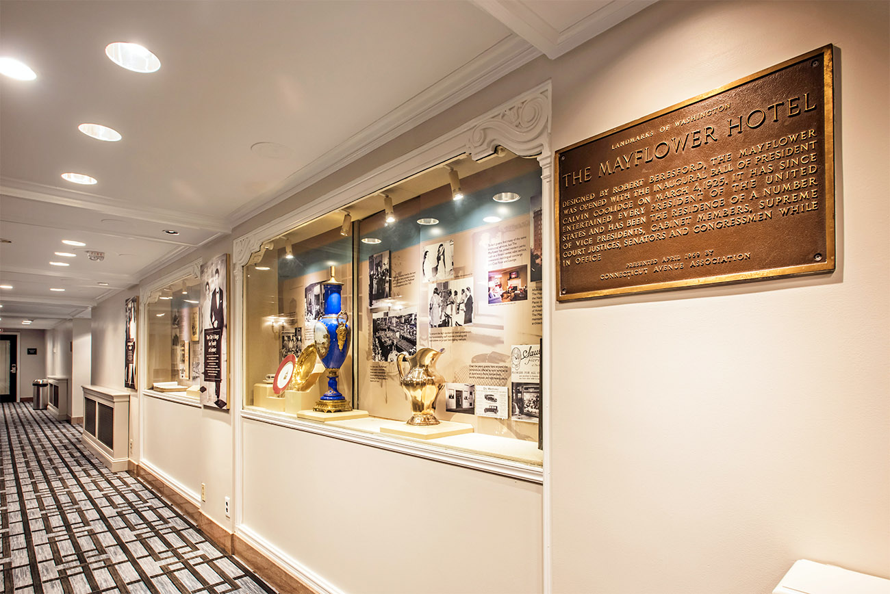 A variety of artifacts and historic objects are on display in a gallery.