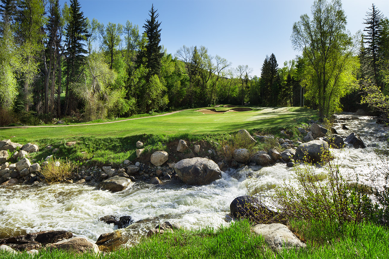 Golf course with a river cutting through it in Steamboat Springs, Colorado