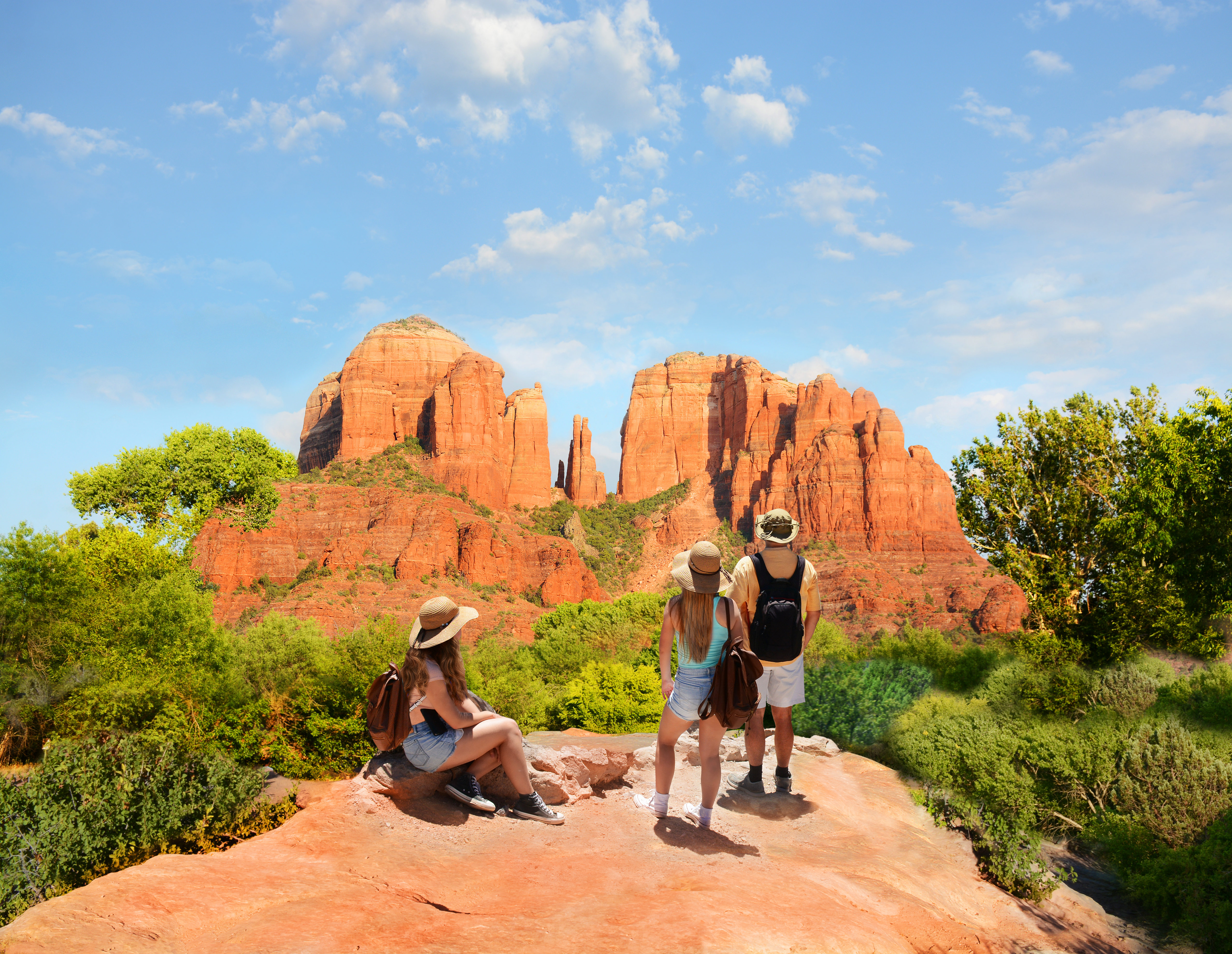 02.	Family on hiking trip enjoying view of Cathedral Rock, Sedona, Arizona.