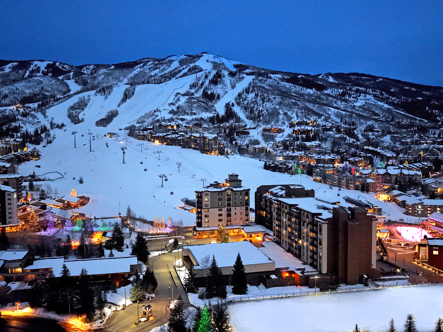 A nighttime aerial view of Sheraton Steamboat Resort Villas in winter.