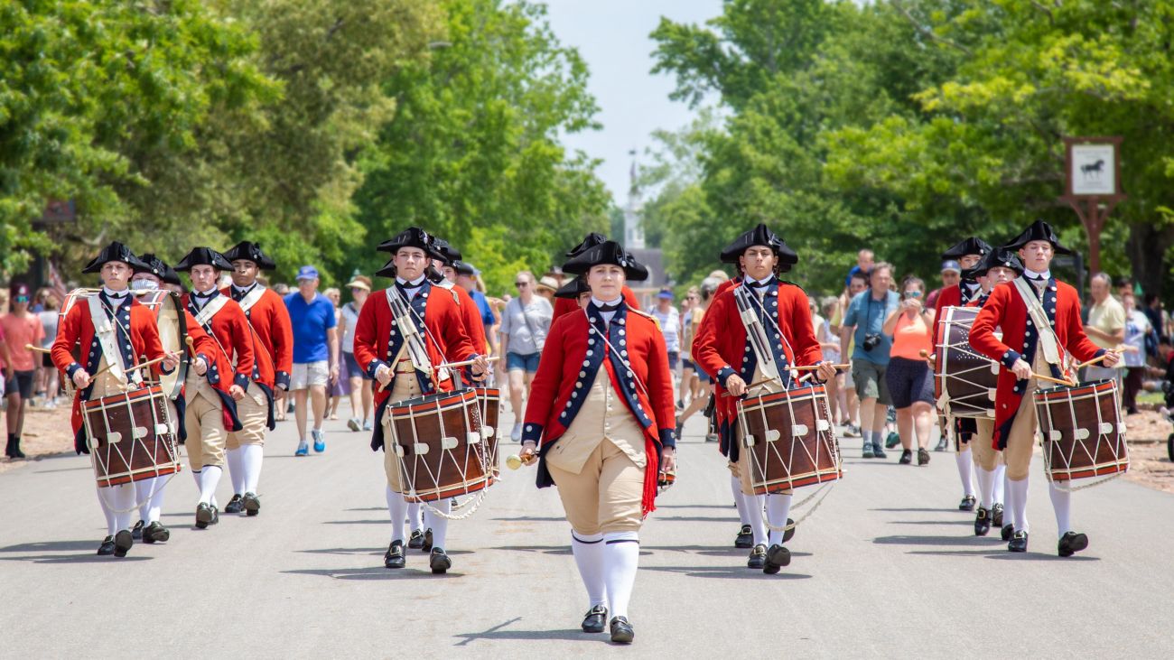 A colonial-era parade during a Fourth of July celebration in Williamsburg.